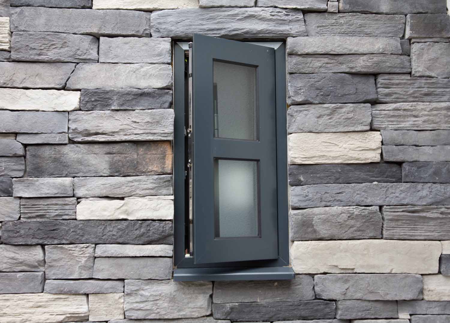 small ajar aluminium window