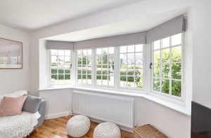 flush modern window with grey blinds