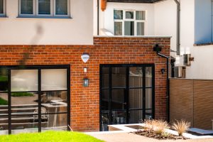 Black alumnium french doors and bifold doors 